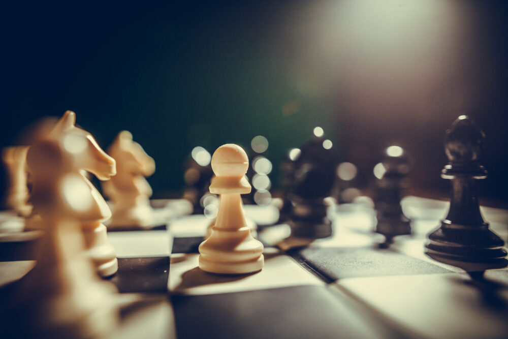 White and black pieces on chess board